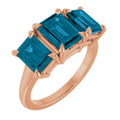 8x6 mm Emerald Natural London Blue Topaz Three-Stone Ring in 14k rose gold