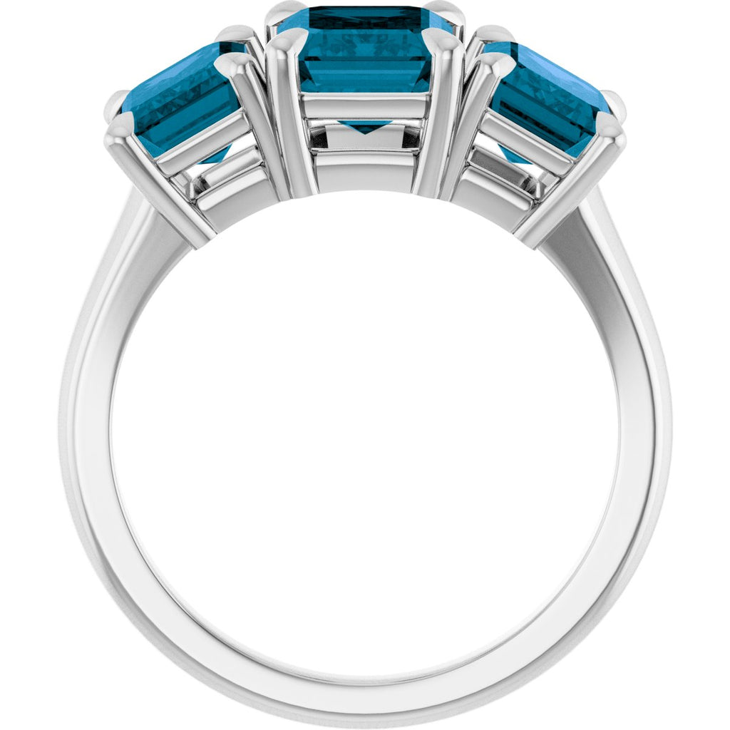 8x6 mm Emerald Natural London Blue Topaz Three-Stone Ring in 14k white gold