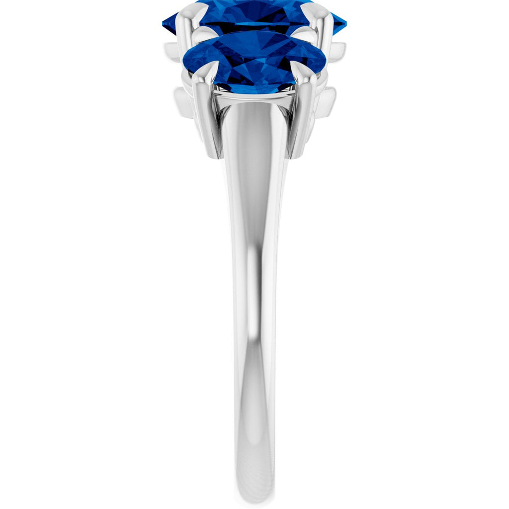 9x7 mm Oval Lab-Grown Blue Sapphire Three-Stone Ring in platinum