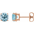 Natural Sky Blue Topaz Four-Prong Stud Earrings in 14k rose gold
