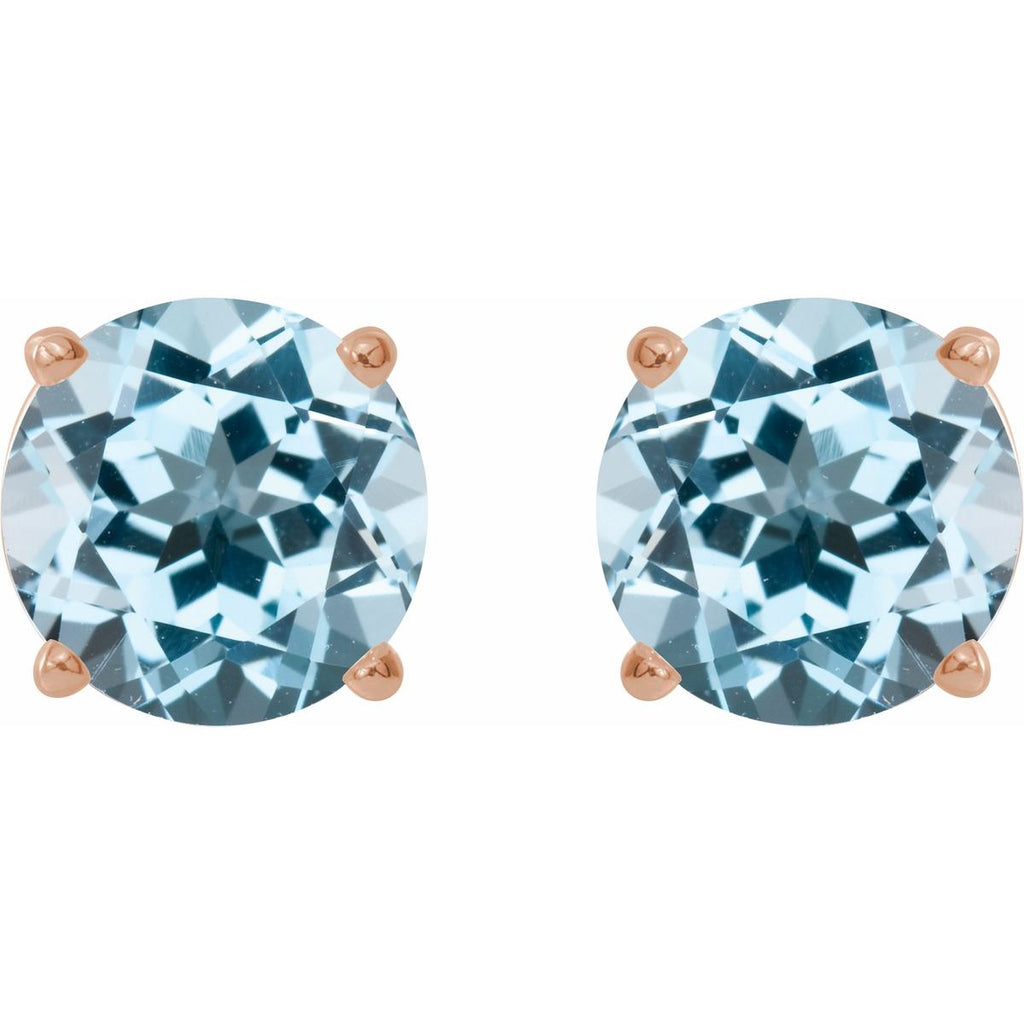 Natural Sky Blue Topaz Four-Prong Stud Earrings in 14k rose gold