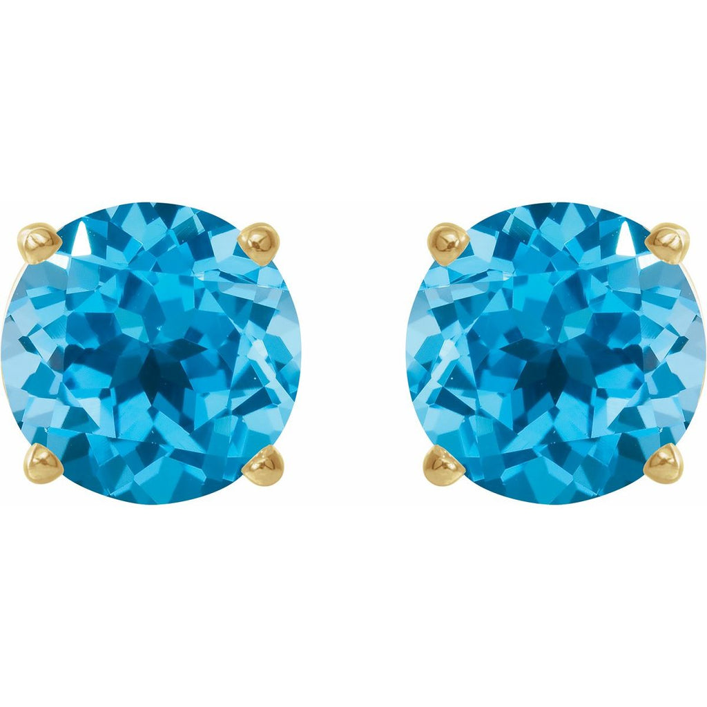 Natural Swiss Blue Topaz Four-Prong Stud Earrings in 14k yellow gold