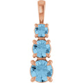 Natural Sky Blue Topaz Three-Stone Pendant in 14k rose gold